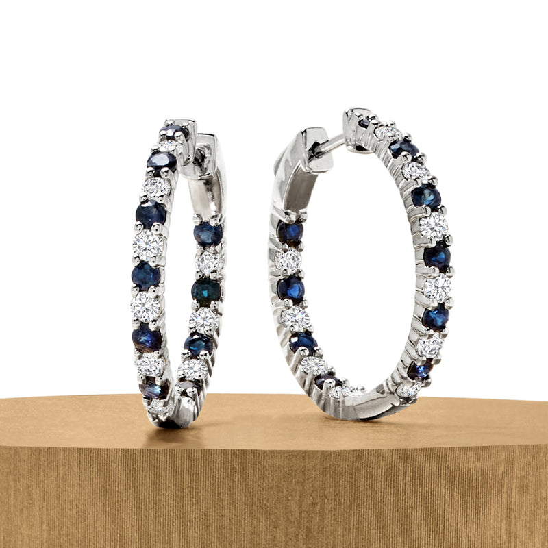 Sterling silver inside-out hoop earrings with blue sapphires and white diamonds