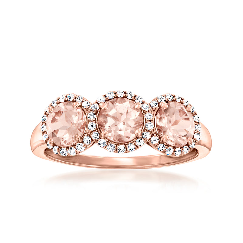 14kt rose gold ring with three oval morganite stones and round diamond halos