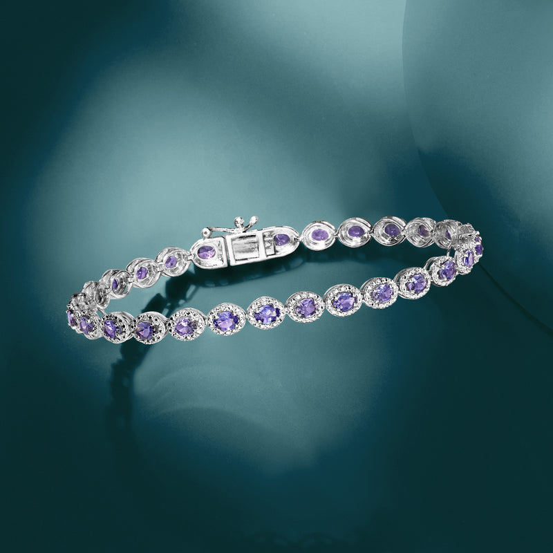 Sterling silver tennis bracelet with oval lavender stones and hinged bar clasp