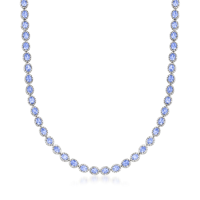 Sterling silver tennis necklace with oval blue gemstones and clear diamond accents