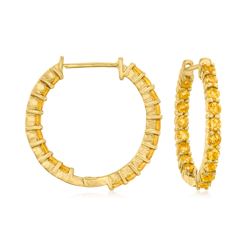 Gold hoop earrings with inside-out yellow gemstone accents
