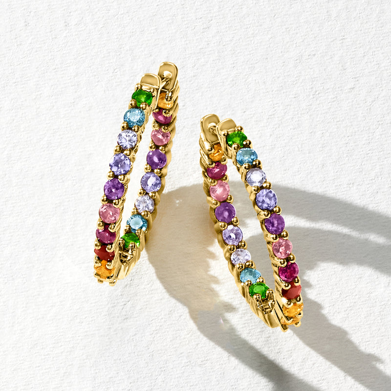 Gold inside-out hoop earrings with multicolor gemstone accents