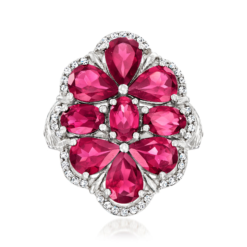 Sterling silver ring with pink rhodolite gemstone cluster and white zircon halo