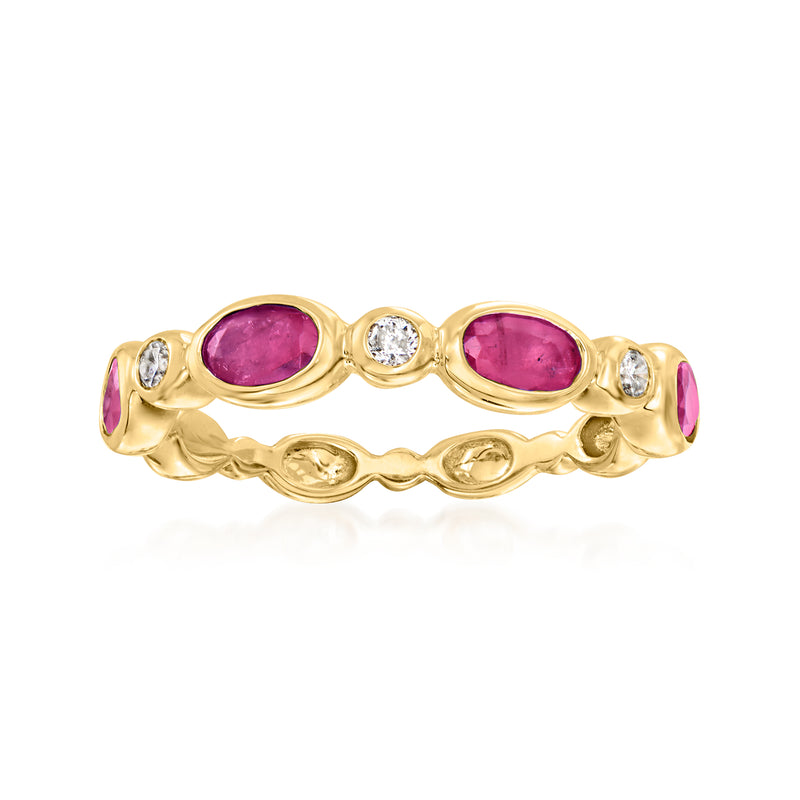 14kt yellow gold ring with two oval ruby gemstones and small round diamond accents