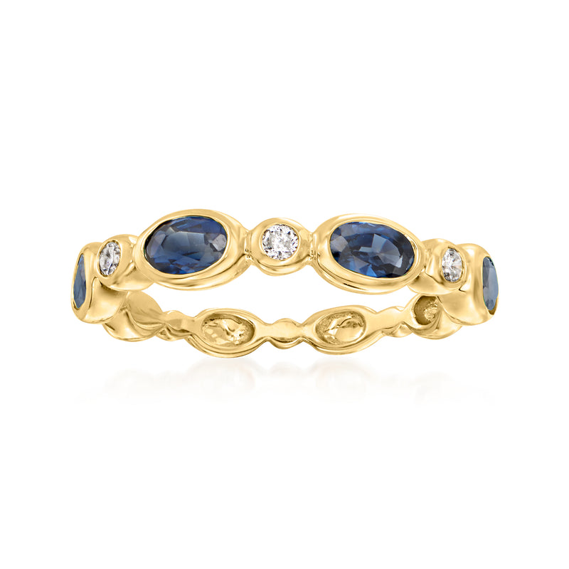 14kt yellow gold ring with two oval blue sapphires and small round diamond accents