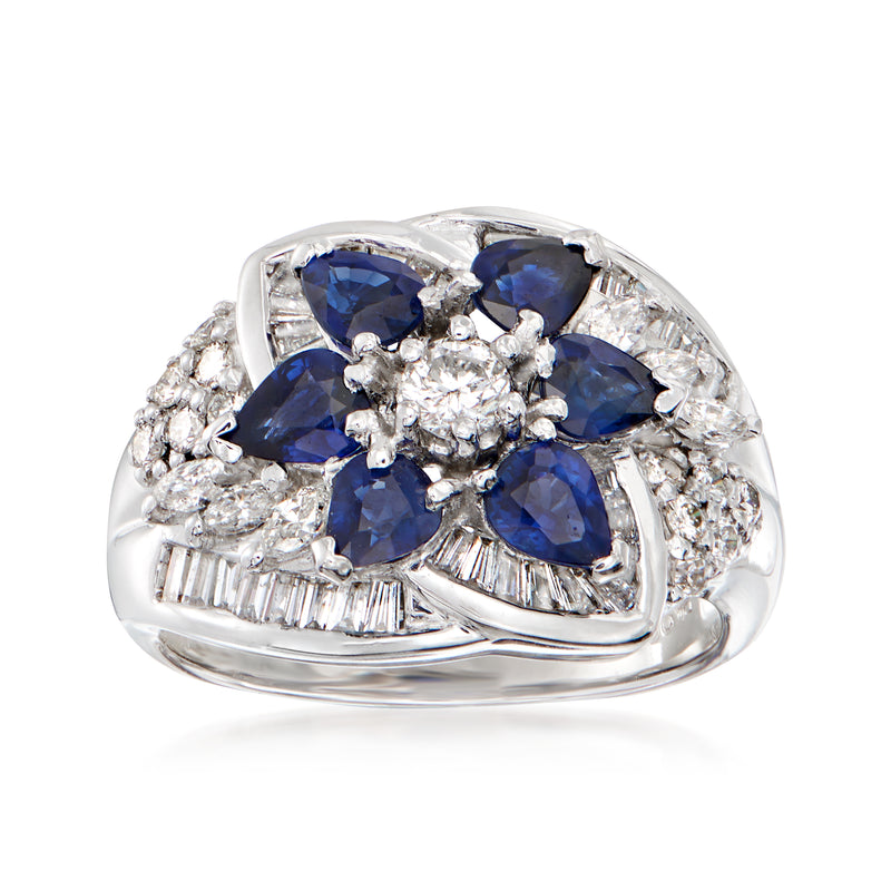 Platinum sapphire and diamond flower ring with five blue stones and clear diamond accents