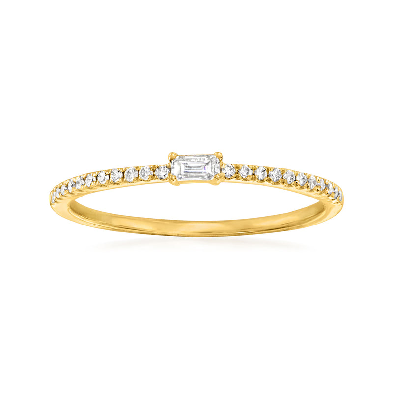 14kt yellow gold diamond ring with baguette center stone and round side diamonds