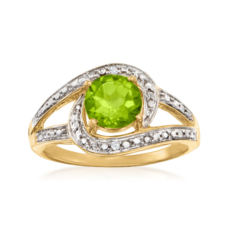 18kt gold over sterling ring with oval peridot center and diamond-like accents
