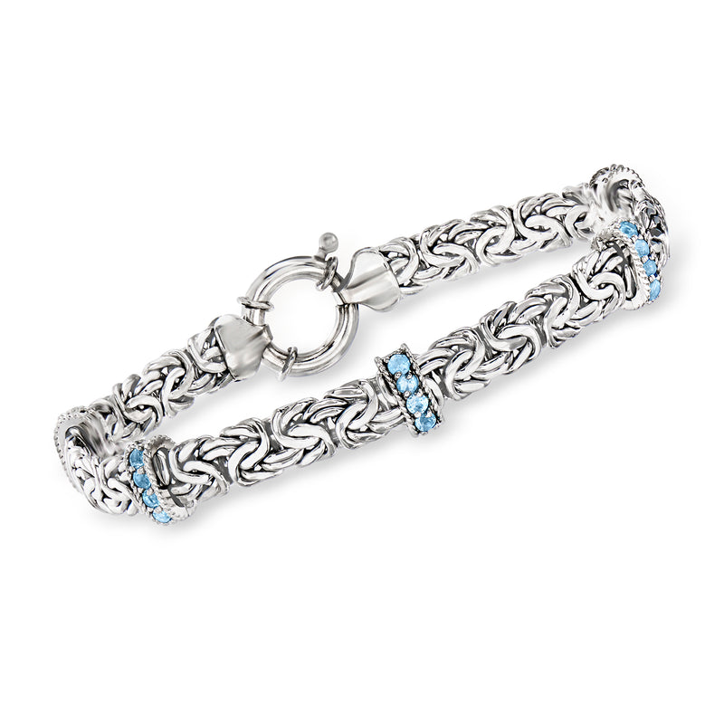 Sterling silver Byzantine chain bracelet with blue topaz stations and ring clasp
