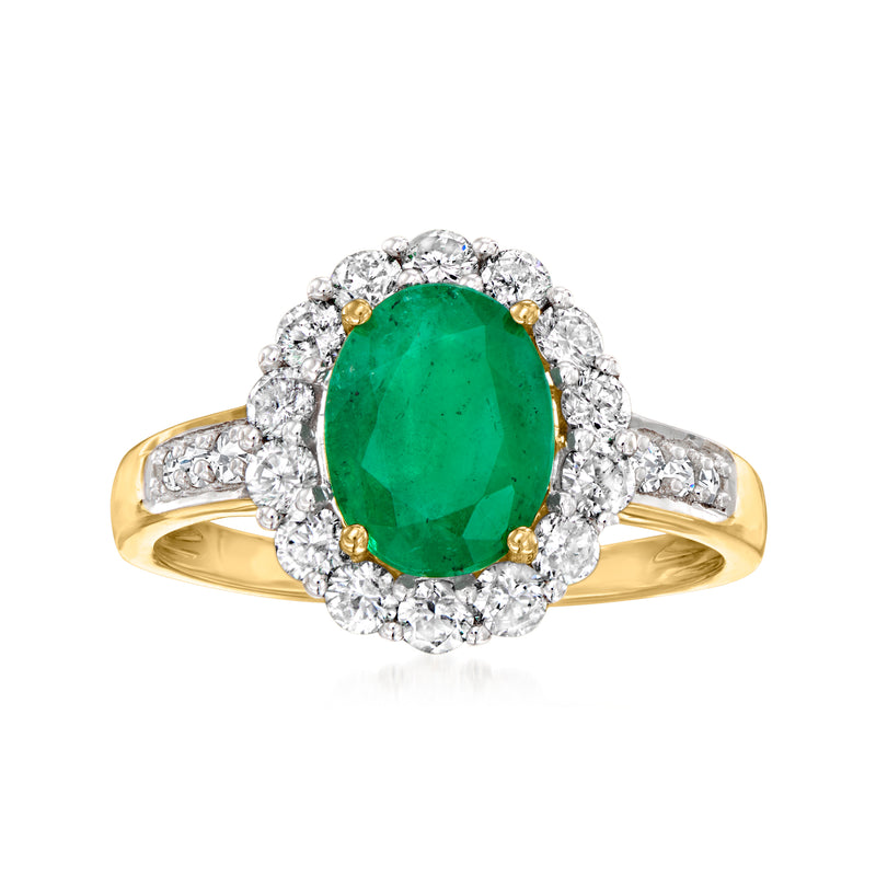 18kt yellow gold ring with oval emerald-green center and diamond halo and side bands