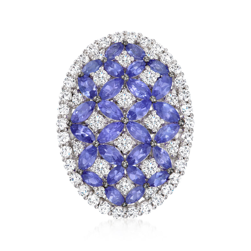 Sterling silver halo ring with blue oval tanzanite and white zircon accents