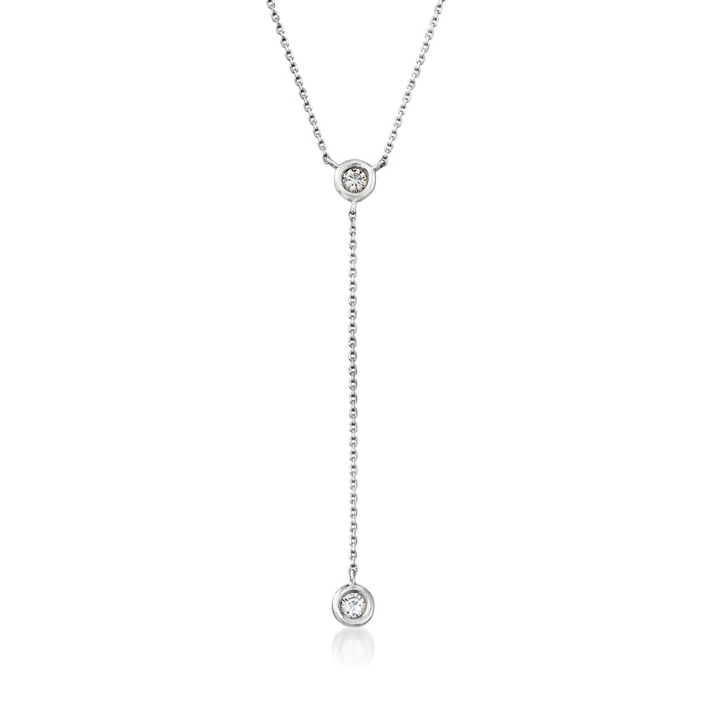 14kt white gold Y-necklace with bezel-set round diamonds and fine chain links