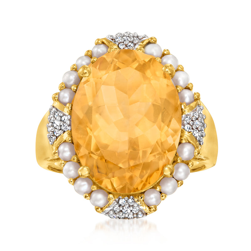 Gold citrine oval ring with diamond halo and white seed pearls
