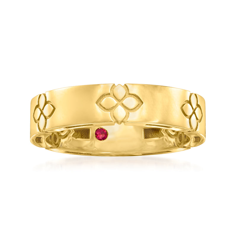 18kt yellow gold ring with engraved heart motifs and a small red gemstone