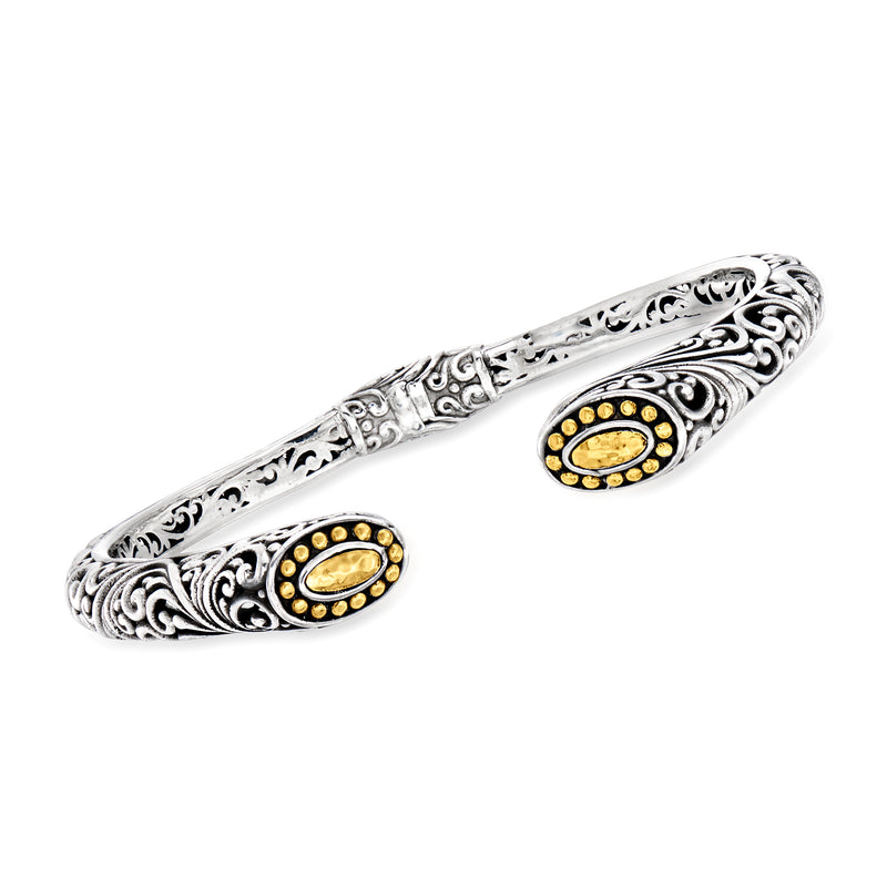 Silver cuff bracelet with ornate scrollwork and oval 18kt yellow gold inlay accents