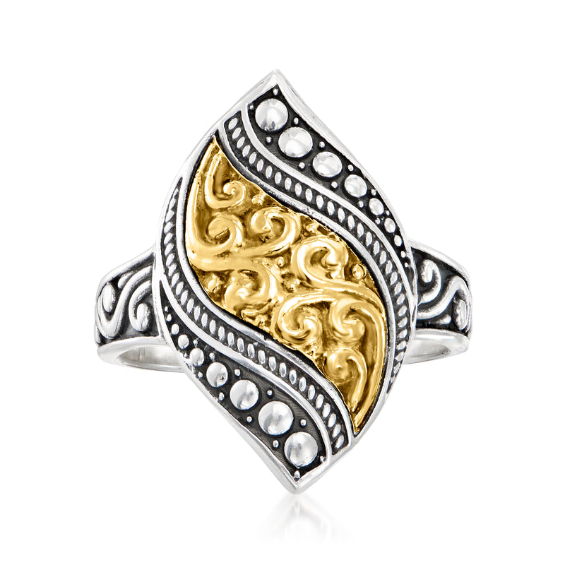 Bali-style scrollwork ring with sterling silver borders and 18kt yellow gold inset, diamond face