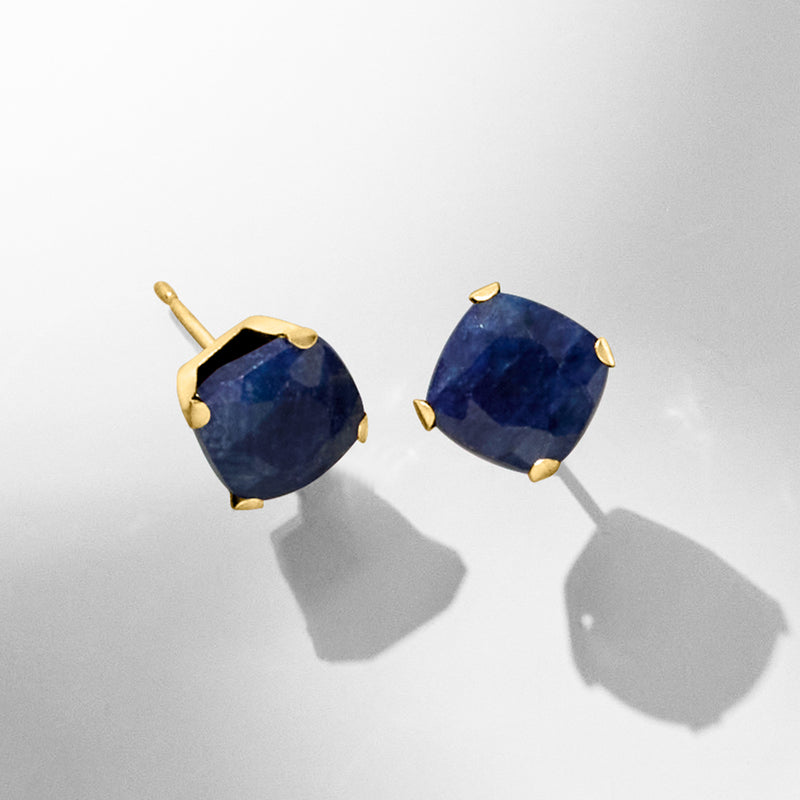 14kt yellow gold sapphire stud earrings with cushion-cut dark blue stones, four-prong settings