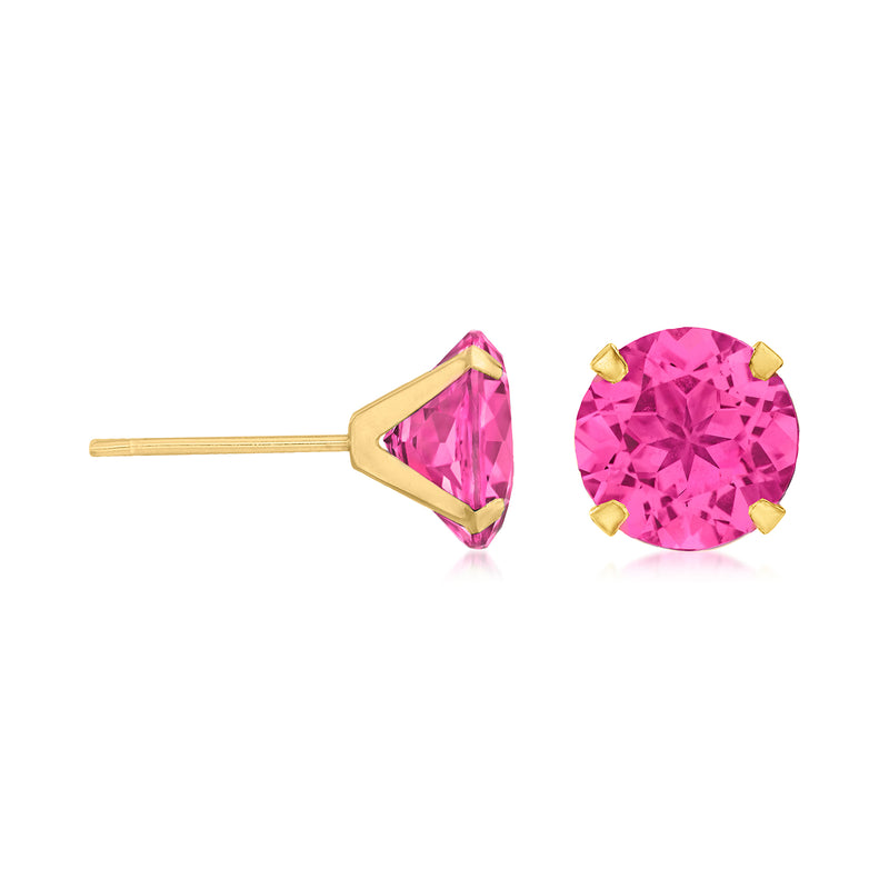 Pink topaz martini stud earrings with round stones and 14kt yellow gold basket settings