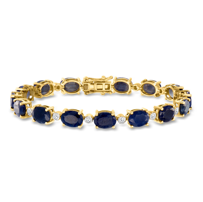 14kt yellow gold sapphire and diamond tennis bracelet with oval blue stones