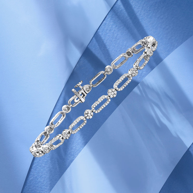 Diamond pave oval link bracelet with box clasp in 14kt white gold