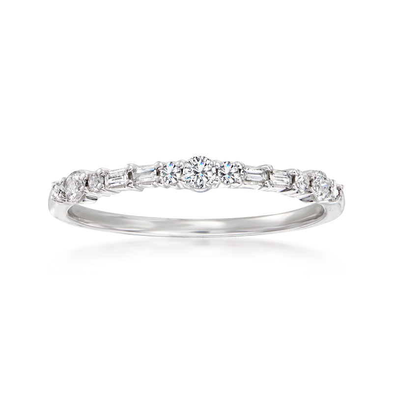 14kt white gold diamond ring with round center stone and baguette accents