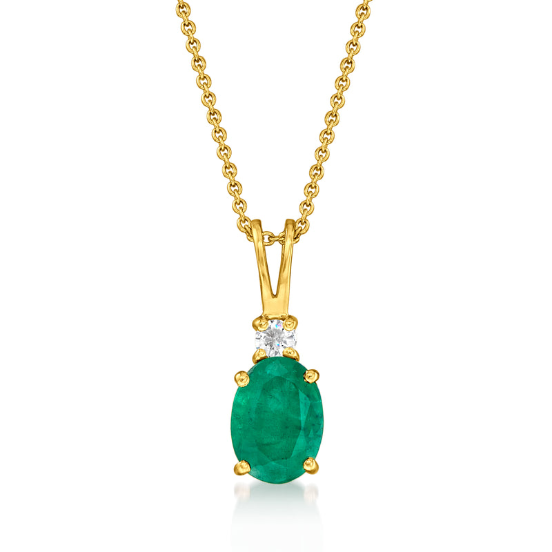 14kt yellow gold pendant necklace with oval green emerald and small diamond detail