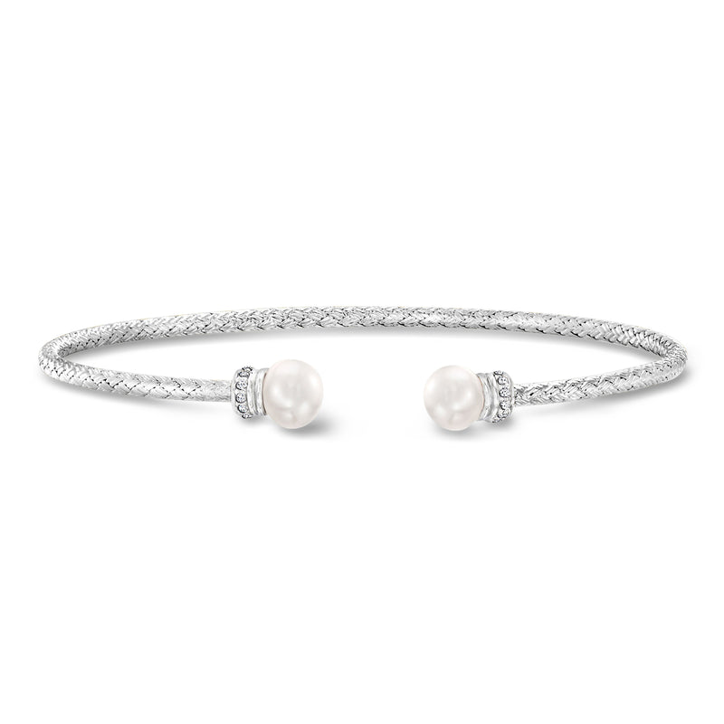 Sterling silver cuff bracelet with textured band, two cultured pearls, and CZ accents