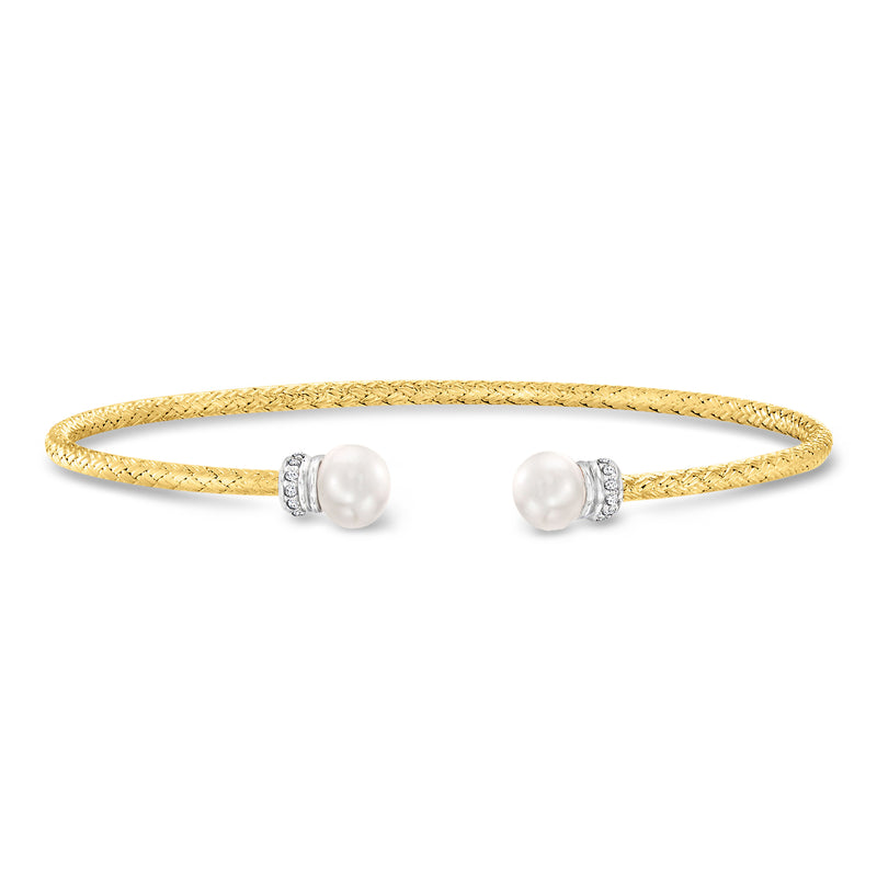 Gold cuff bracelet with two cultured pearls and CZ accents, hinged design