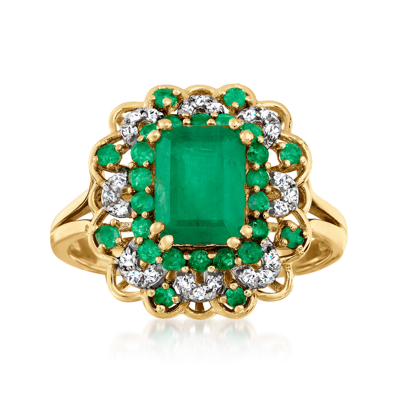 14kt yellow gold ring with emerald-cut green center and round diamonds halo