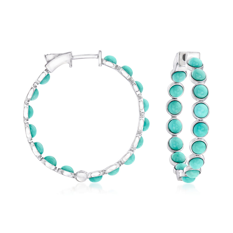 Sterling silver hoop earrings with turquoise inside-out stones and hinged clasp.
