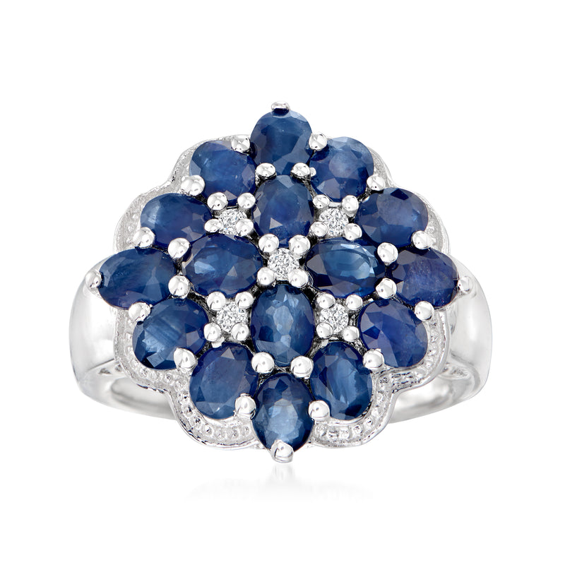 Sterling silver cluster ring with deep blue oval sapphires and diamond accents