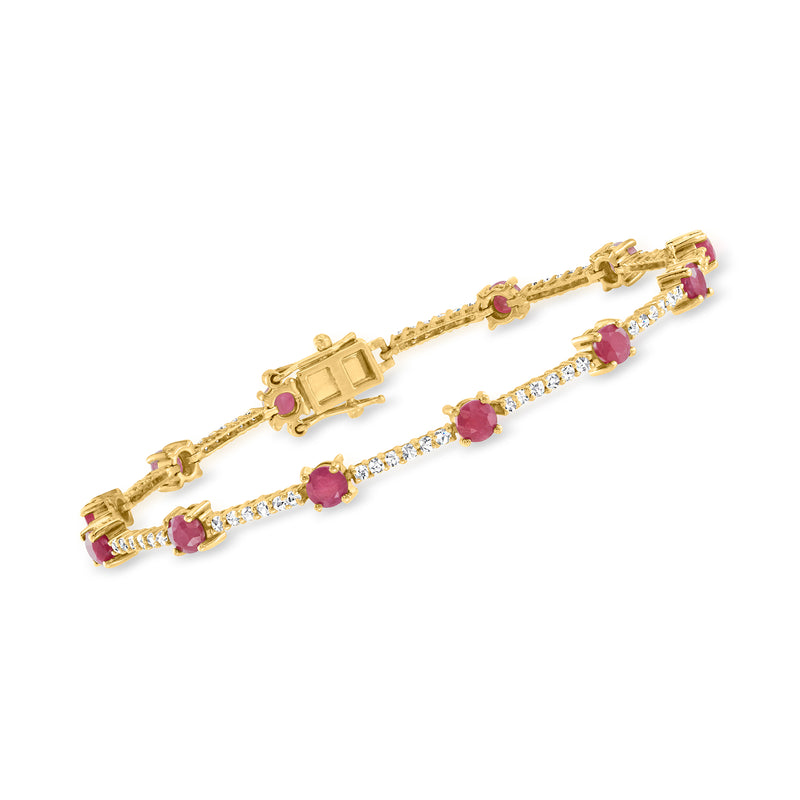 14kt yellow gold bracelet with round pink rubies and white diamond accents