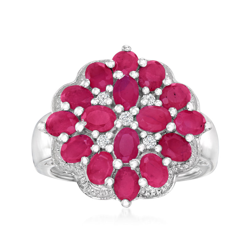 Sterling silver cluster ring with oval ruby stones and small white diamond accents
