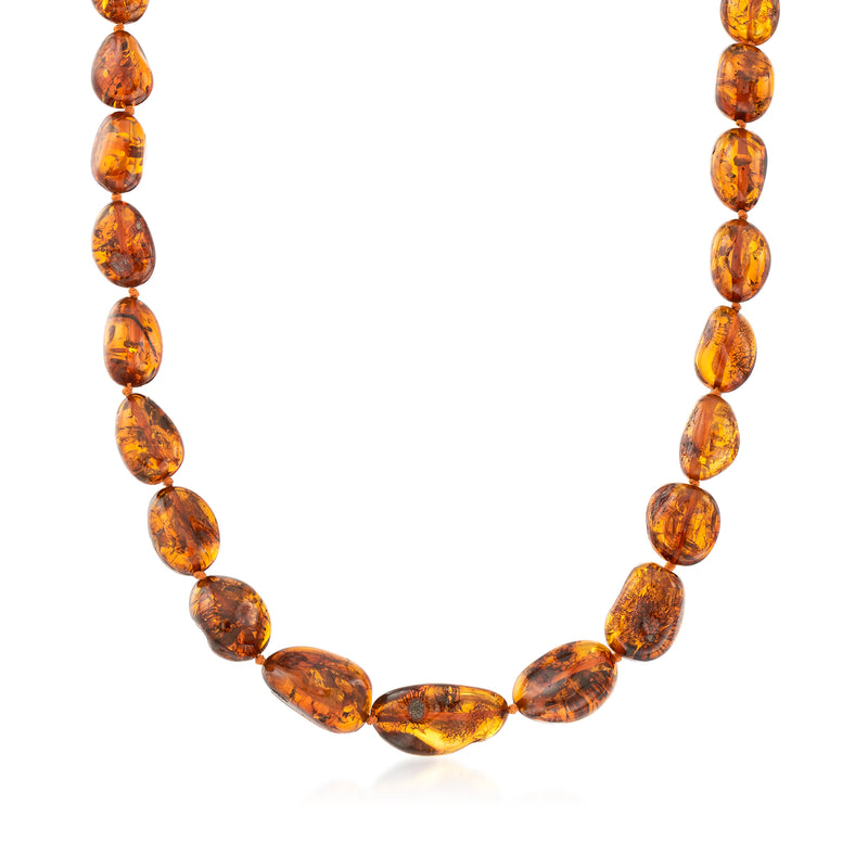 Amber oval bead necklace with sterling silver spacers