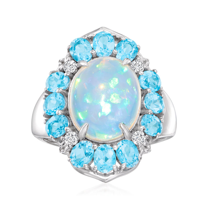 Sterling silver ring with oval opal center, blue topaz halo, zircon side stones