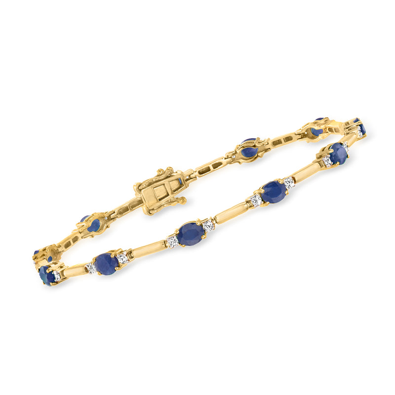 14kt yellow gold bracelet with blue sapphire oval stones and small diamond accents