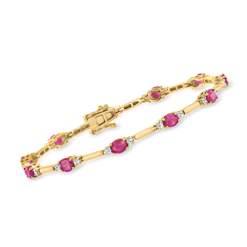 14kt yellow gold bracelet with oval pink ruby stones and small diamond accents