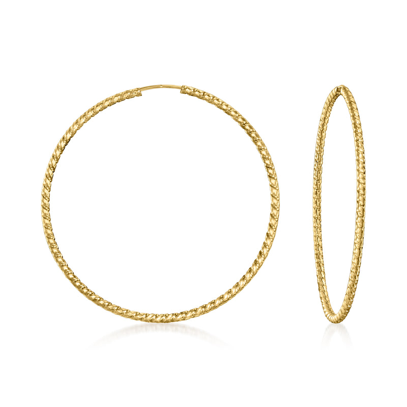 Twisted yellow gold hoop earrings, round wire style with hinged clasp
