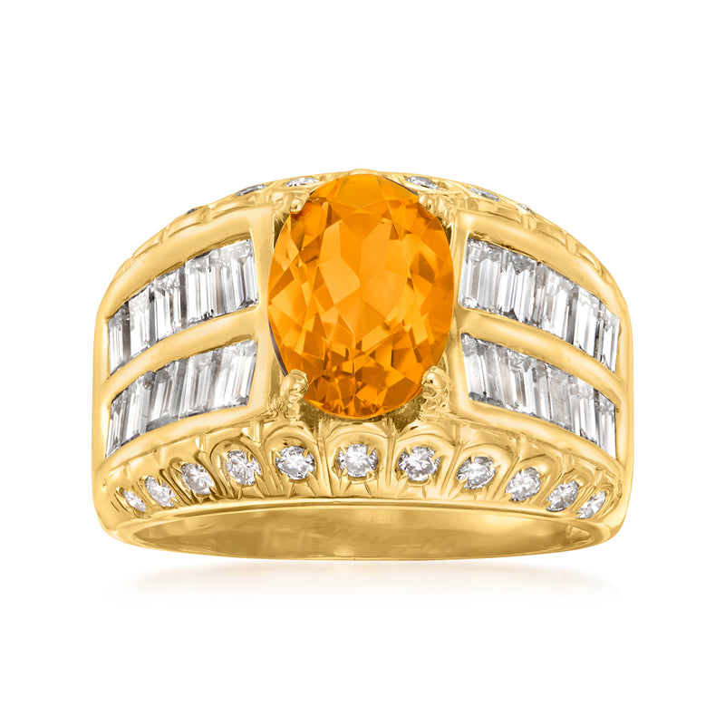 18kt yellow gold citrine ring with oval orange gemstone and diamond baguette sides