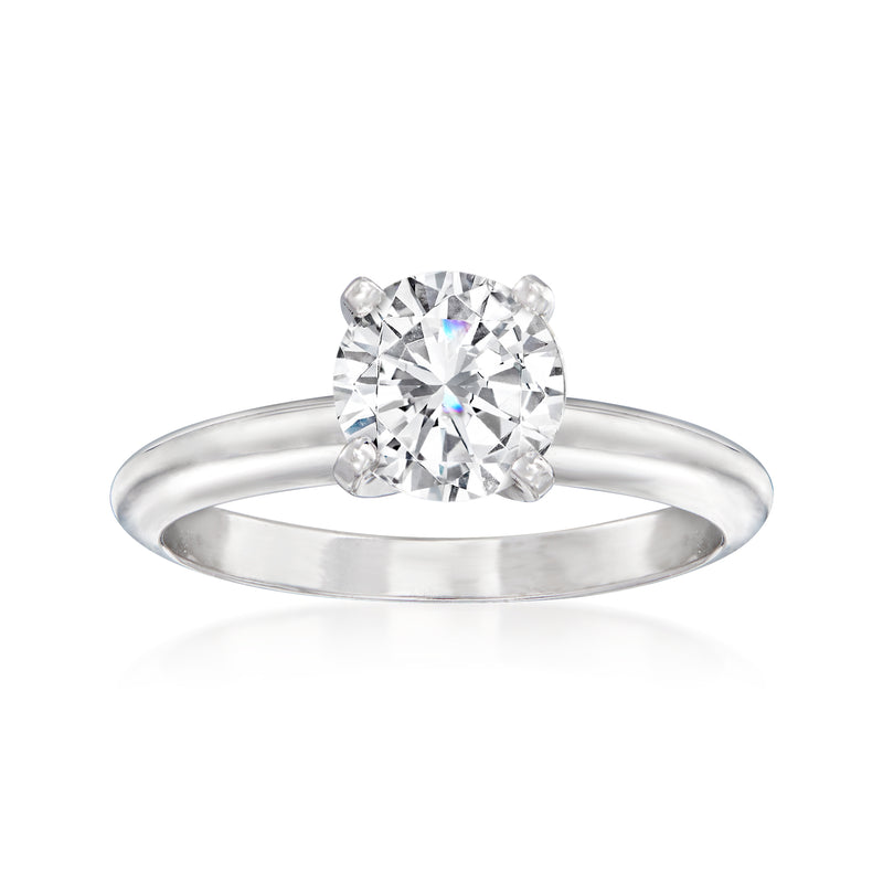 14kt white gold solitaire diamond ring with round center stone, four-prong setting