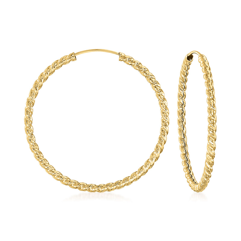 Twisted yellow gold hoop earrings, rope-textured oval hoops