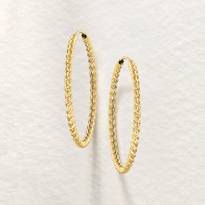 Twisted yellow gold hoop earrings, open oval hoops with hinge details