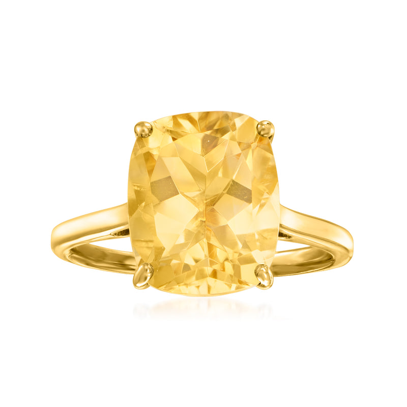 Oval yellow citrine ring in gold-tone setting with four prongs