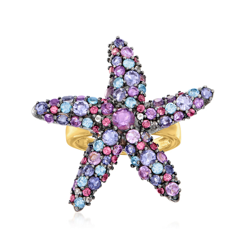 Gold-tone starfish ring with pink, purple, and blue gemstone clusters