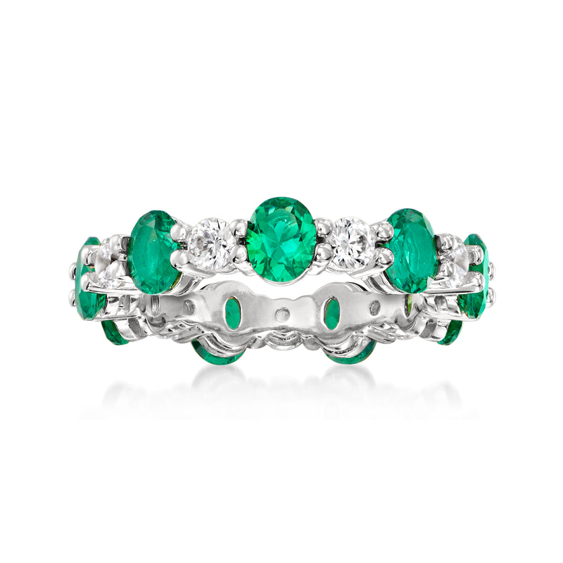 Sterling silver eternity band with green simulated emerald and clear CZ round stones