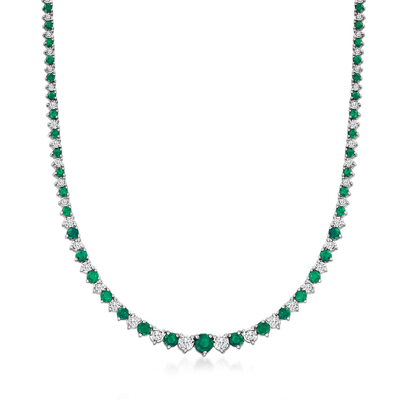 Sterling silver tennis necklace with green emerald-cut stones and white diamond accents