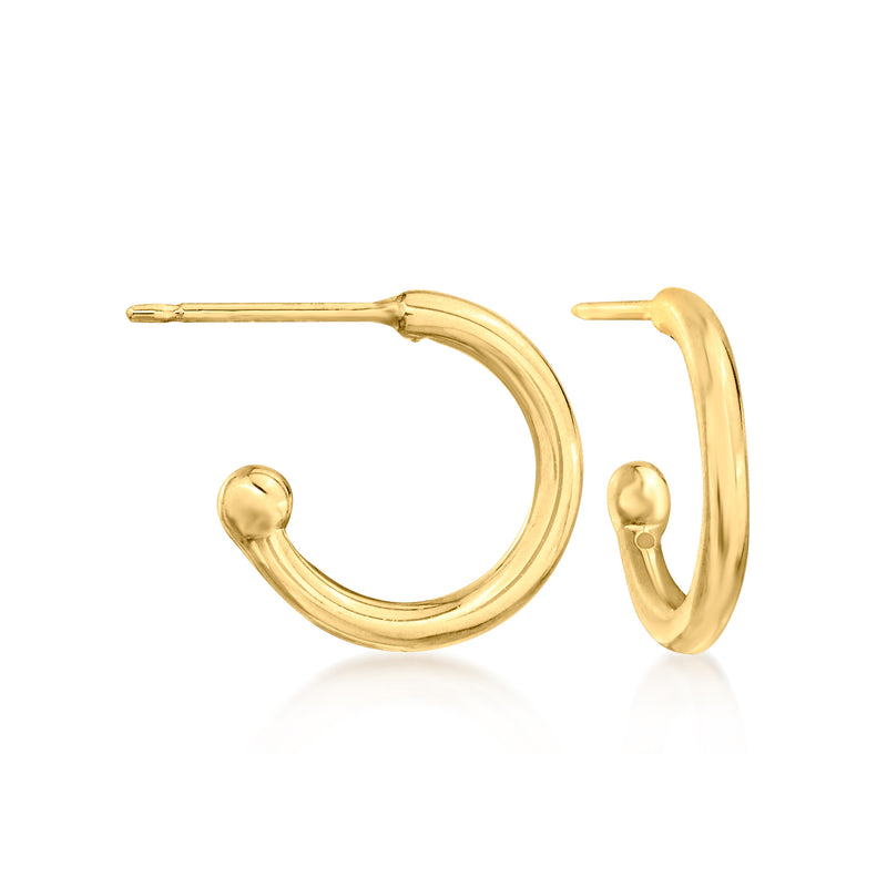 14kt yellow gold hinged hoop earrings with detachable cross charm, side view