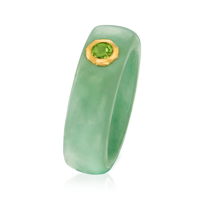 Jade band ring with round green peridot set in yellow gold bezel