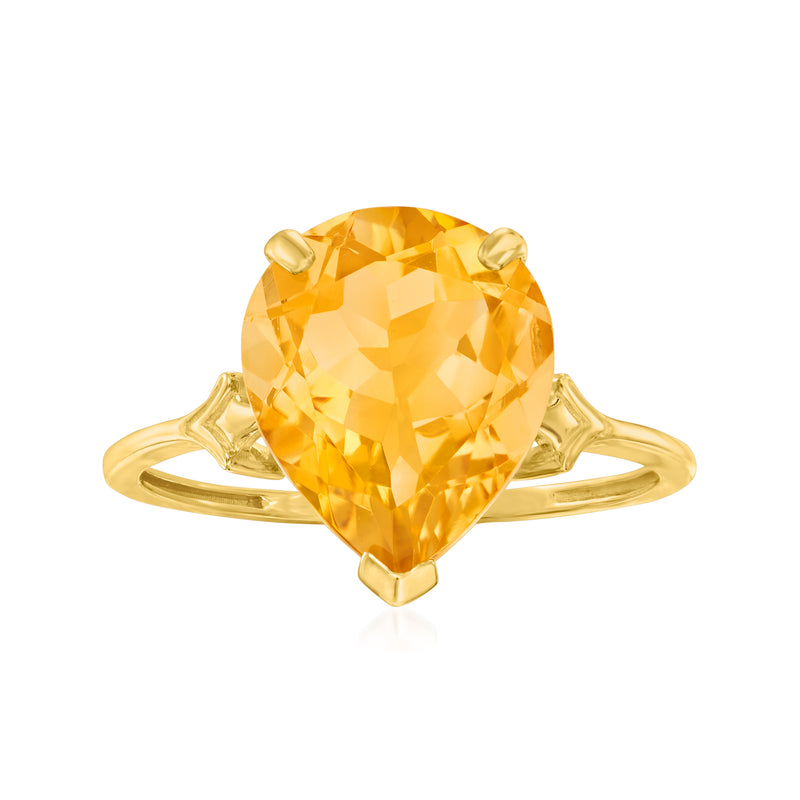 14kt yellow gold citrine ring with large round-cut citrine center and four prongs