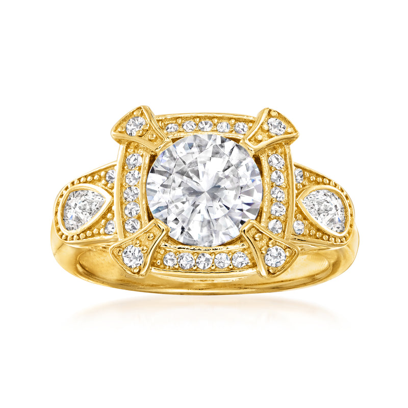 Gold-tone vintage CZ ring with round center stone and small side stones